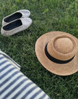 Cappello in rafia a falda larga